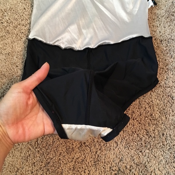 Azul by Maxine of Hollywood
Tropical Print One Piece Faux Swim Skirtini
Size 10 - Picture 14 of 16